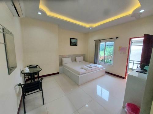 Pra Thai Apartment | รีสอร์ทตลาดไทร