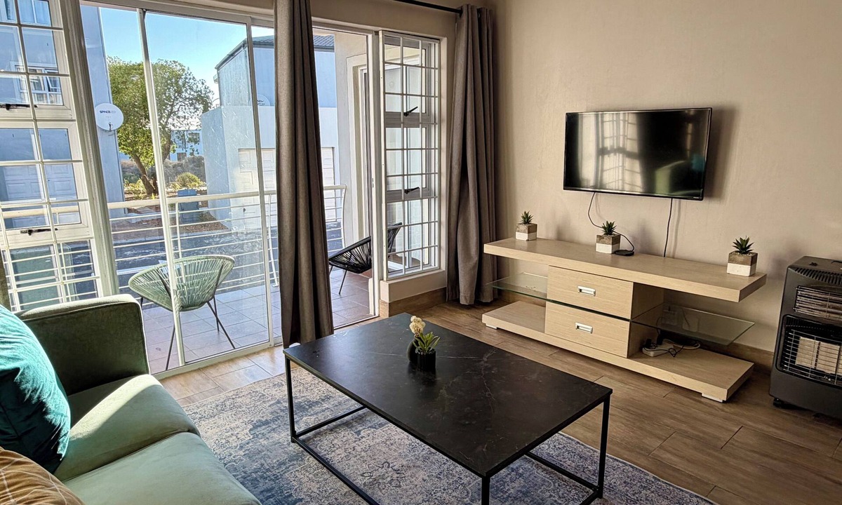 Big Bay House | A cosy retreat, a walk away from Big bay with Table mountain in the horizon