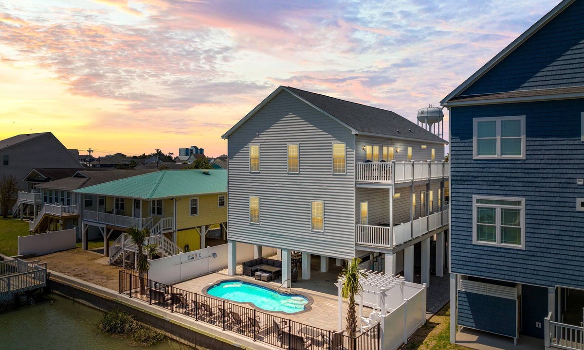 Cherry Grove Beach House | Amazing Channel Retreat Private Pool Luxury Outdoor Living & Pet Friendly