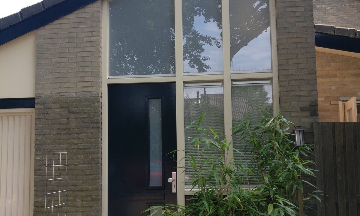 Oudorp Apartment | Apartment in Alkmaar, in the district of Oudorp with a polder landscape with windmills,