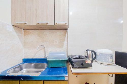 Panunggangan Utara Apartment | Cozy and Minimalist Studio Great Western Apartment By Travelio