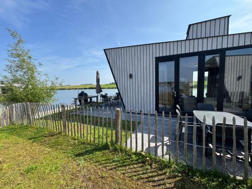 Kampen House | De IJssel Eilanden Chalet Laguna Kampen mit Zaun Nr 754