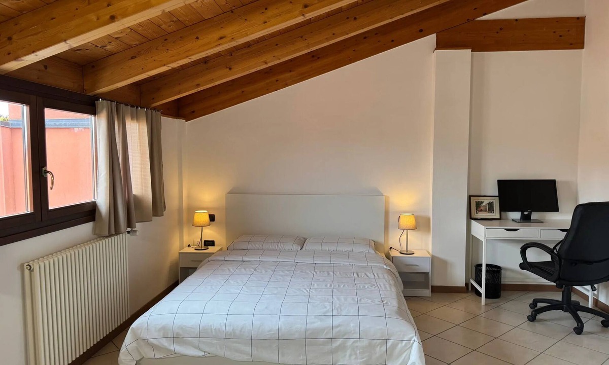 Casalecchio di Reno Apartment | Delightful and romantic attic room in Bologna just a stone's throw from the Unipol Arena