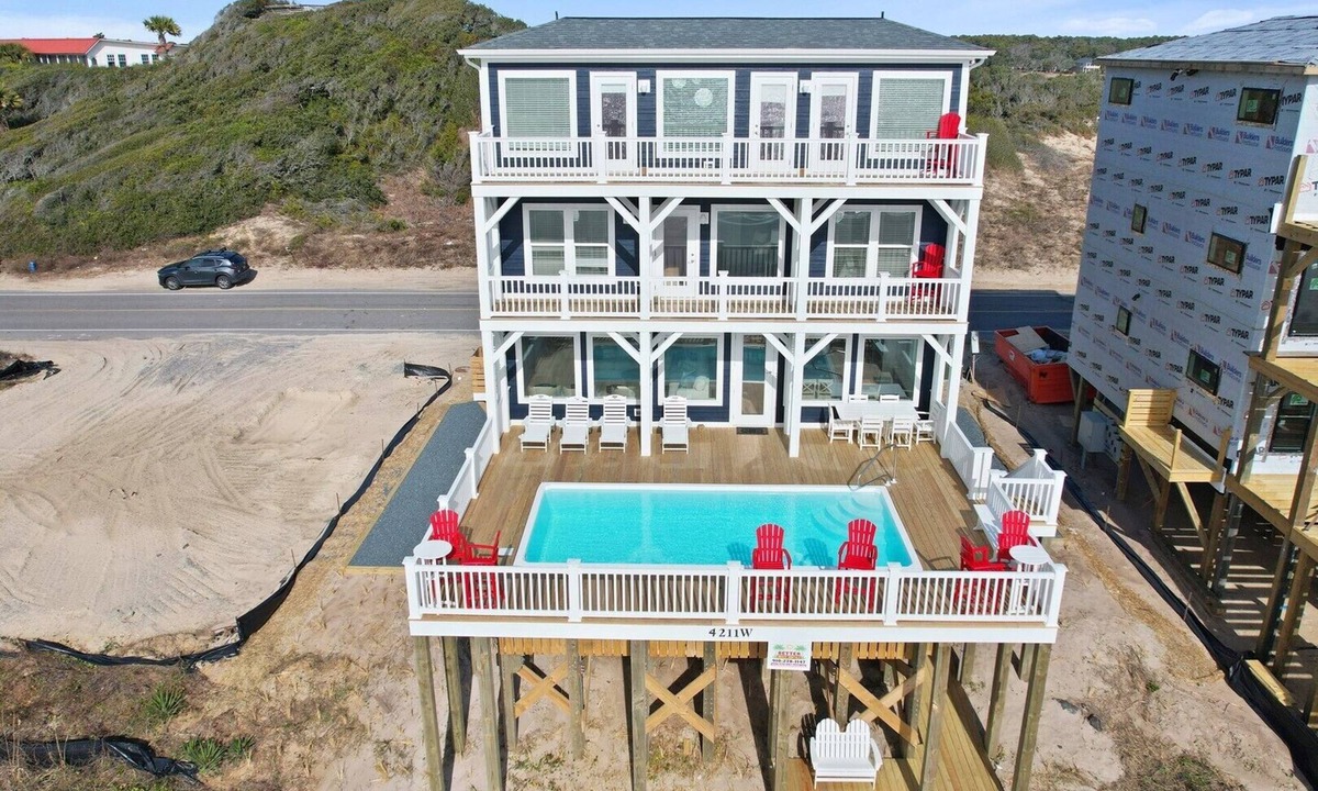 Oak Island House | Experience luxury at '7 Day Weekend,' an oceanfront 7-bedroom retreat in Oak Island.