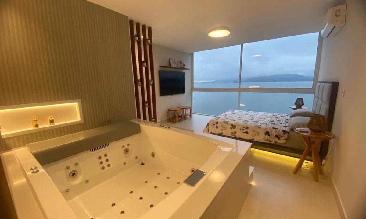 Ponta Leste Apartment | Home Sweet Sea. Beachfront Retreat: Luxury, Comfort and Exclusive SPA
