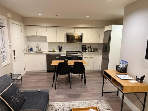 Lower Lonsdale Apartment | Modern Private 1 Bedroom Suite - Assigned Parking and Patio