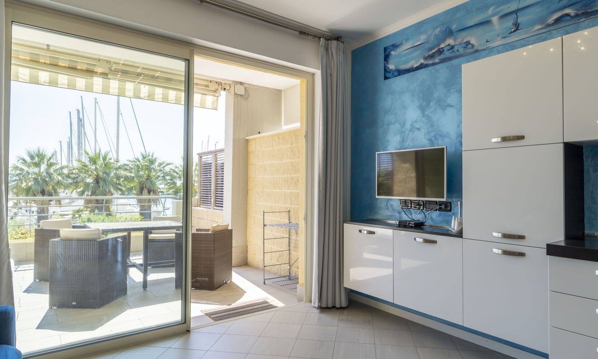 Santo Stefano al Mare Apartment | Nice apartment for 4 people with pool, A/C, WIFI and balcony