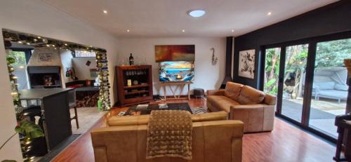 Parklands Villa | Out of Africa - 5 Bedroom indoor outdoor living with 2 firepits and sunroom