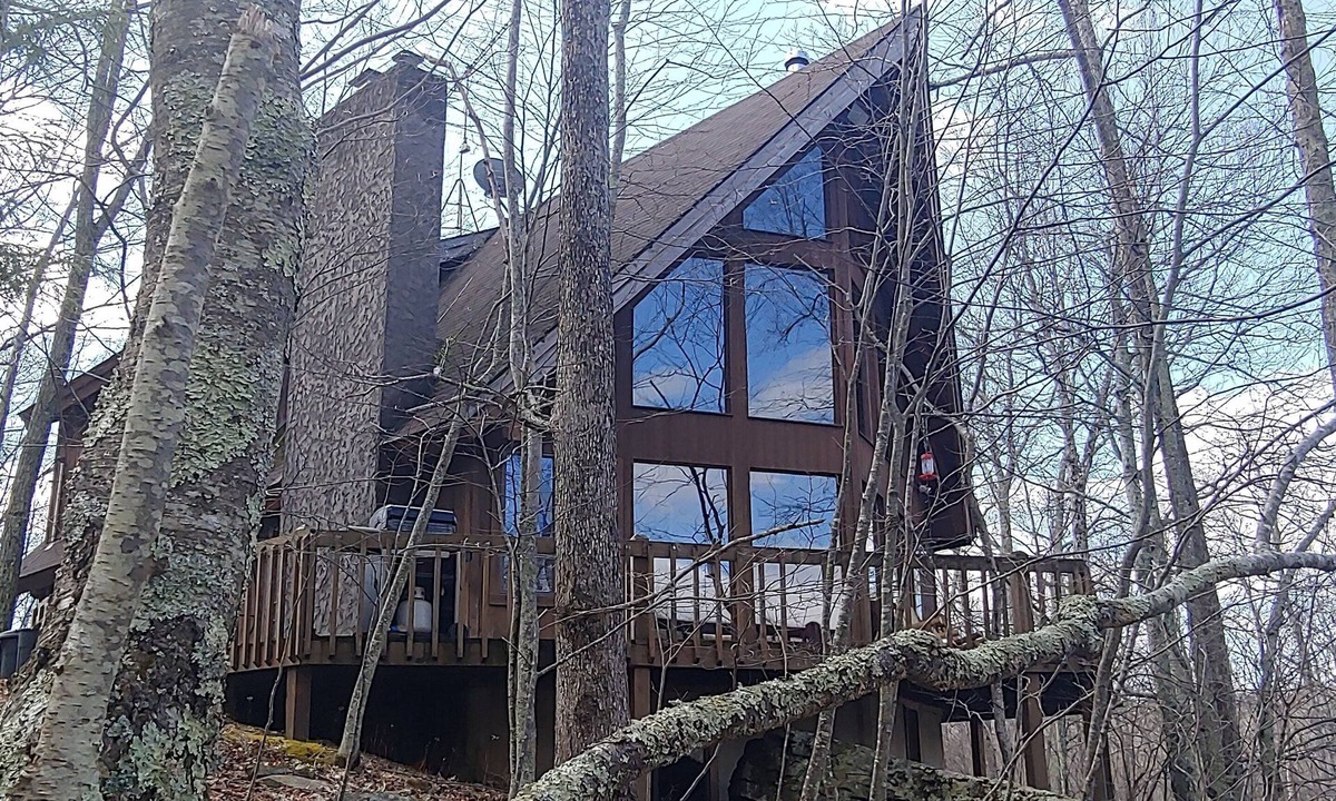 Cresco House | Pocono Private lake setting with, Hot Tub, boat dock, fishing, Swimming, Canoe
