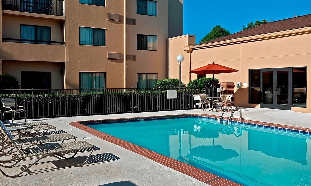 University Place Hotel | Recharge on a Pet Friendly Suite & Access to Pool |Near Charlotte Motor Speedway