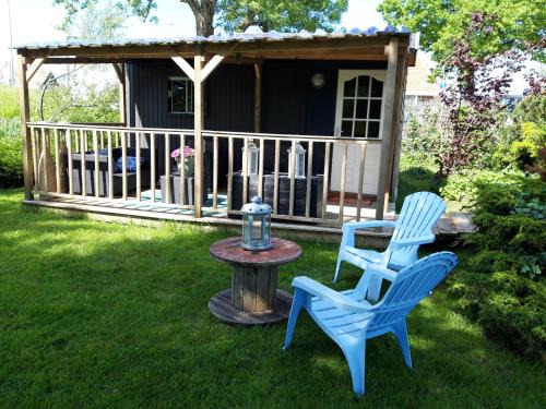 Oterleek Apartment | Tinyhouse NATUURHUISJE met veranda Bij de Molen tussen Alkmaar en Hoorn