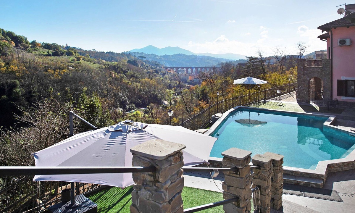 Campomorone House | Vacation Home "Baia Di Campo" with Shared Pool, Private Garden, and Wi-Fi