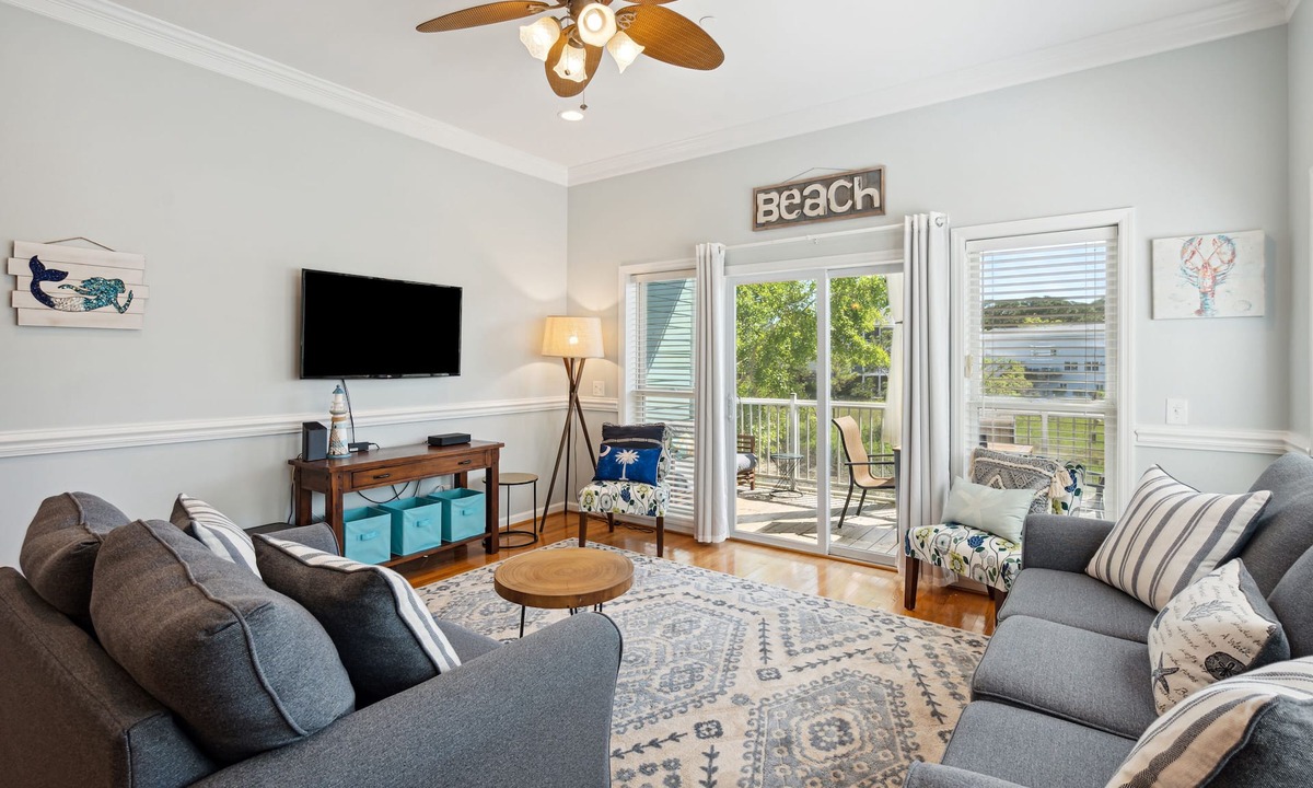 Waters Edge House | Water's Edge 103 - Bright 3BR/3BA Townhome - Pool - Fishing Dock