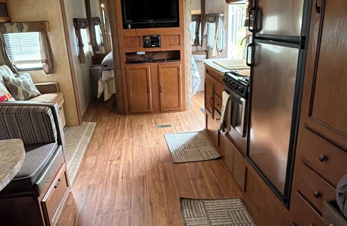 Oxford RV Rental | 1-bedroom camper on a campground resort with home amenities in charming Oxford.