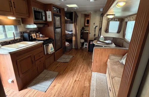 Oxford RV Rental | 1-bedroom camper on a campground resort with home amenities in charming Oxford.