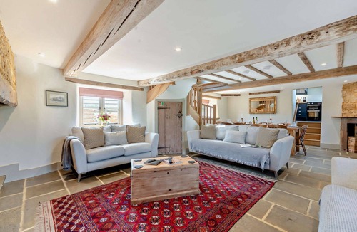 Banbury Cottage | 16th century converted mill in the Cotswolds with a hot tub -Little Barford Mill