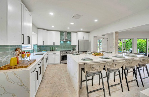17th Street Causeway House | 180' of Waterfront | Heated Pool | Walk To Beach | Paradise Point Key | RESIDENCES