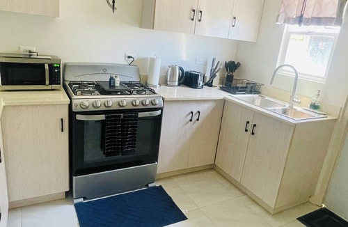 Discovery Bay House | 2-bed, 2-bath house near beaches & local vibes. Gated community