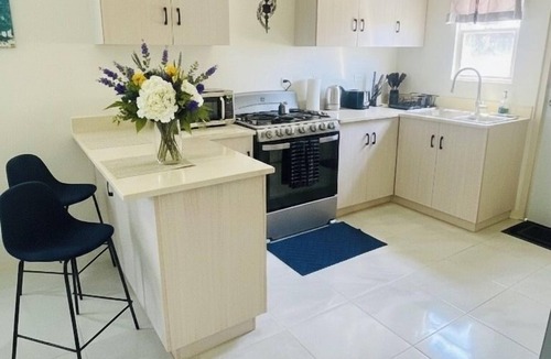 Discovery Bay House | 2-bed, 2-bath house near beaches & local vibes. Gated community