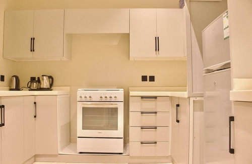 Al Aqiq Apartment | A2-Elegant High-Rise with Warm & Inviting Decor