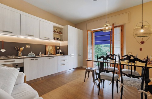 Fiesole Apartment | Apartment 'Il Nido Emozioni Charme E Colori' with Balcony, Wi-Fi and Air Conditioning