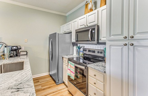 Carolina Yacht Landing Condo | Balcony + Pool Access: Serene Little River Retreat