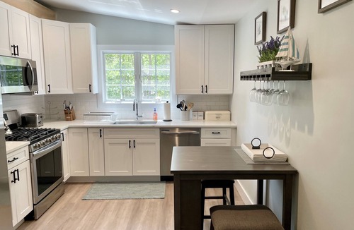 Springs House | Beautiful Home with walking distance to the beach, new 46ft pool! EV charger