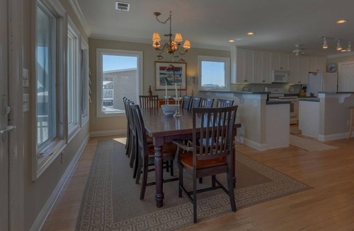 Holden Beach House | Bee Holden - Enjoy the beautiful Atlantic ocean from the deck while relaxing on the porch swing
