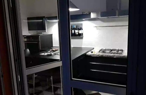 Granarolo dell'Emilia Apartment | Black and white Apartment