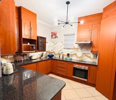 Rustenburg Apartment | Brytelight Luxe Hideaway-Relaxing Poolside Stay