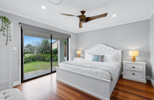 Broadbeach Waters House | Canal Sanctuary - Waterside Living with Pool & Jetty