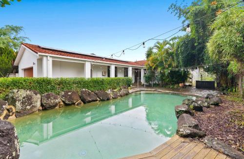 Broadbeach Waters House | Canal Sanctuary - Waterside Living with Pool & Jetty