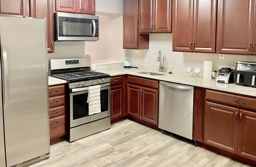 Cross Country Condo | Charm City Getaway! Workspace Available! Free Parking!