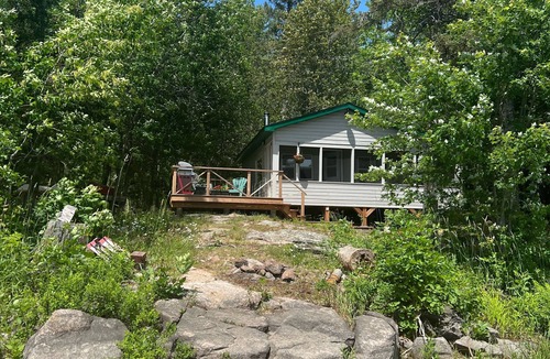 Monetville Cabin | Charming, quiet & rustic cabin on the French River with enclosed porch and deck