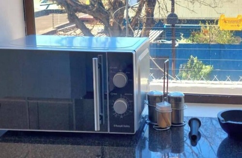 Norwood Apartment | Chic 1-bedroom with WiFi and fitness room in vibrant Johannesburg