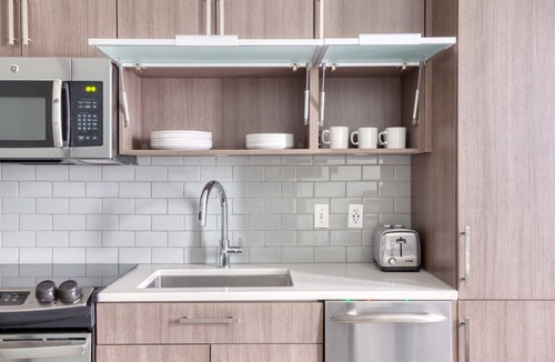 Buzzard Point Apartment | Chic Navy Yard 1BR w/W/D, Roof BBQ & Gym, near Nats Park, by Blueground