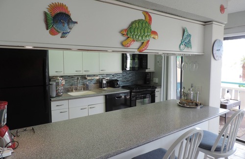 Estate Golden Rock Condo | Come Sail Away and relax at our beautifully remodeled 2Br/2Ba condo on the beach