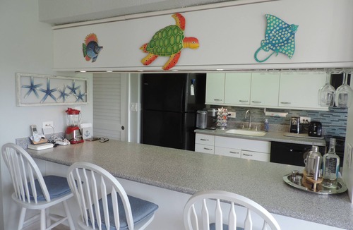 Estate Golden Rock Condo | Come Sail Away and relax at our beautifully remodeled 2Br/2Ba condo on the beach