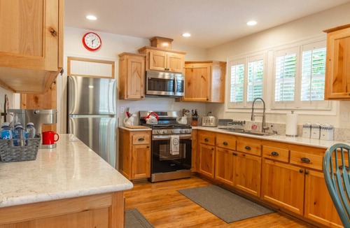 Camarillo House | Comfy Red Farmhouse gives you Rest and Relaxation