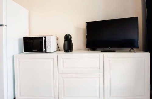 Marina di Bibbona Apartment | Cosy apartment for 4 guests with WIFI, A/C, pool, TV and patio