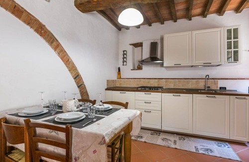 Castelnuovo di Val di Cecina Villa | Cosy apartment in villa for 4 people with pool, WIFI, TV, patio and pets allowed