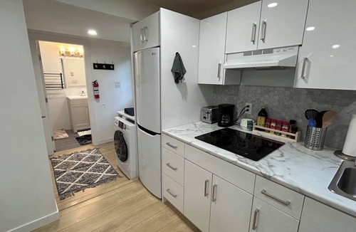 Lynn Valley House | Cozy 2BR Garden Suite w/Private Yard & EV Charger near Grouse Mountain & Trails