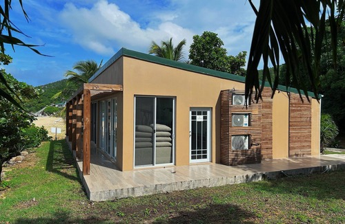 East End Condo | Cozy Beachfront Oasis less than 10 steps away from white sand beach