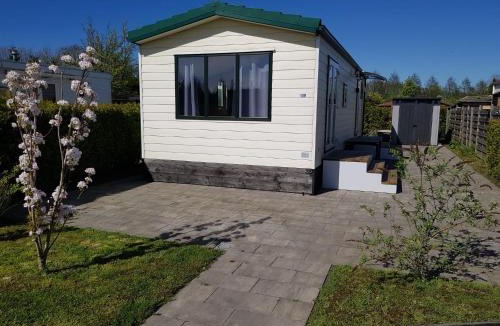 Berkhout Ski Chalet | Cozy chalet near Amsterdam at Camping Venhop