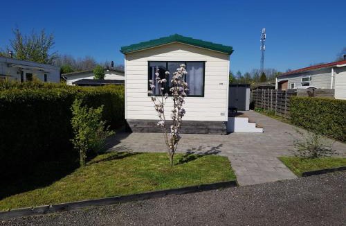 Berkhout Ski Chalet | Cozy chalet near Amsterdam at Camping Venhop
