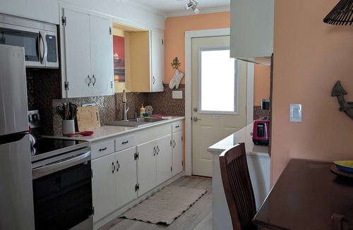 Supply Cottage | Cozy Cottage one mile from the Beach and Boat Ramp! Pet Friendly Too!