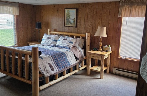 Shawano Cottage | Cozy lakefront home rests on Shawano Lake - swimming, fishing, boating, dock.