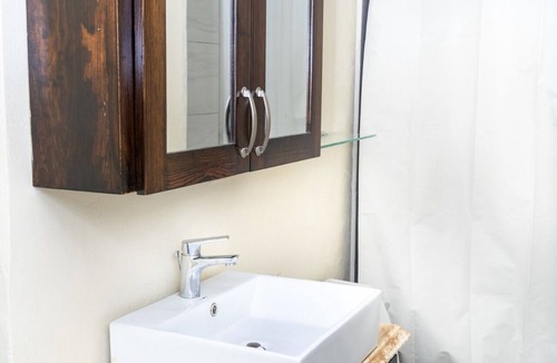 Port of Spain Apartment | Cozy Nook nestled in the Santa Cruz Valley. Queen sized bed Hot and cold shower