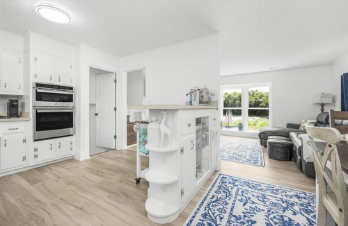 Buxton Cottage | Cypress Cove, situated in Buxton on a soundfront lot, provides a peaceful setting in this charming rental cottage.