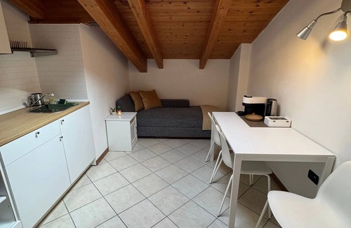 Casalecchio di Reno Apartment | Delightful and romantic attic room in Bologna just a stone's throw from the Unipol Arena